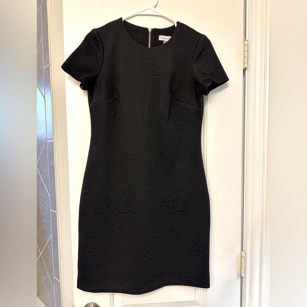 Calvin Klein black dress. Size 4. Roses quilted subtle pattern.